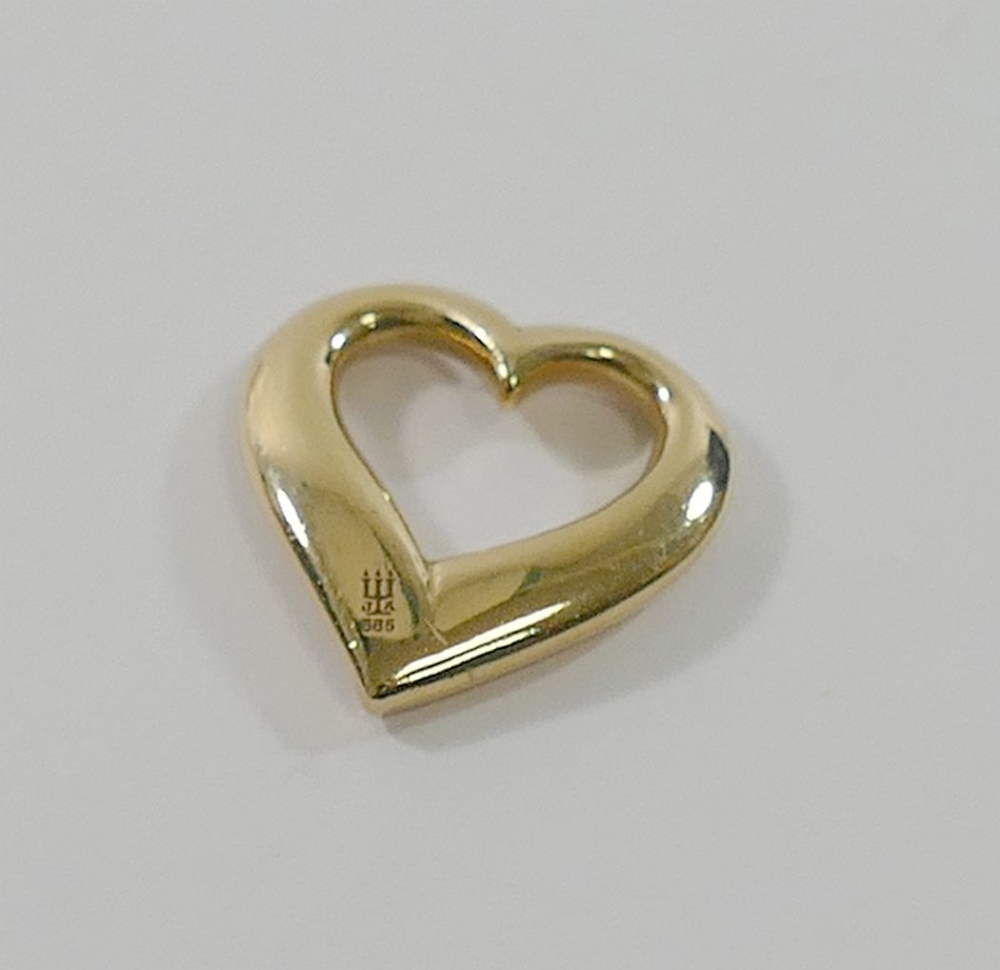 An American James Avery yellow metal open heart pendant, with maker's mark, stamped '585', 2cm long,