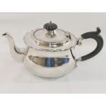 A George V silver teapot with ebonised handle and knop, Birmingham 1927, 11.17ozt, 347.5g
