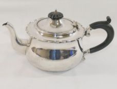A George V silver teapot with ebonised handle and knop, Birmingham 1927, 11.17ozt, 347.5g