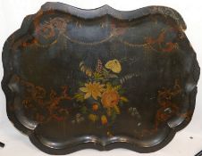 A large Victorian papier machè cartouche-shaped tray, decorated with flowers, swags and acanthus