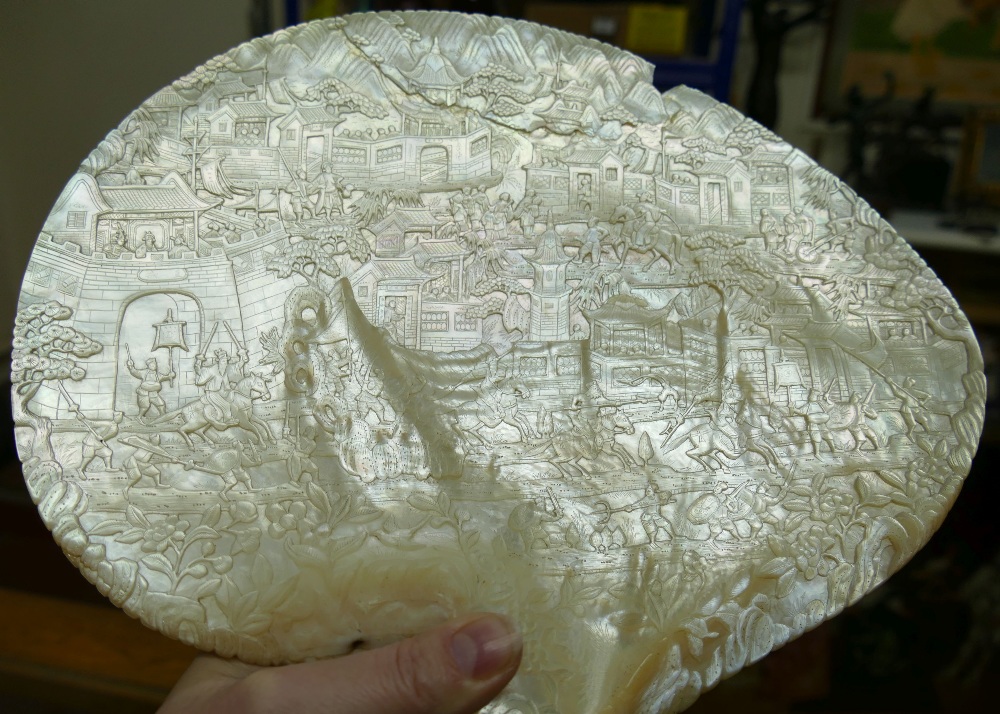 A large Chinese carved mother of pearl shell intricately decorated with a battle scene amongst - Image 7 of 7