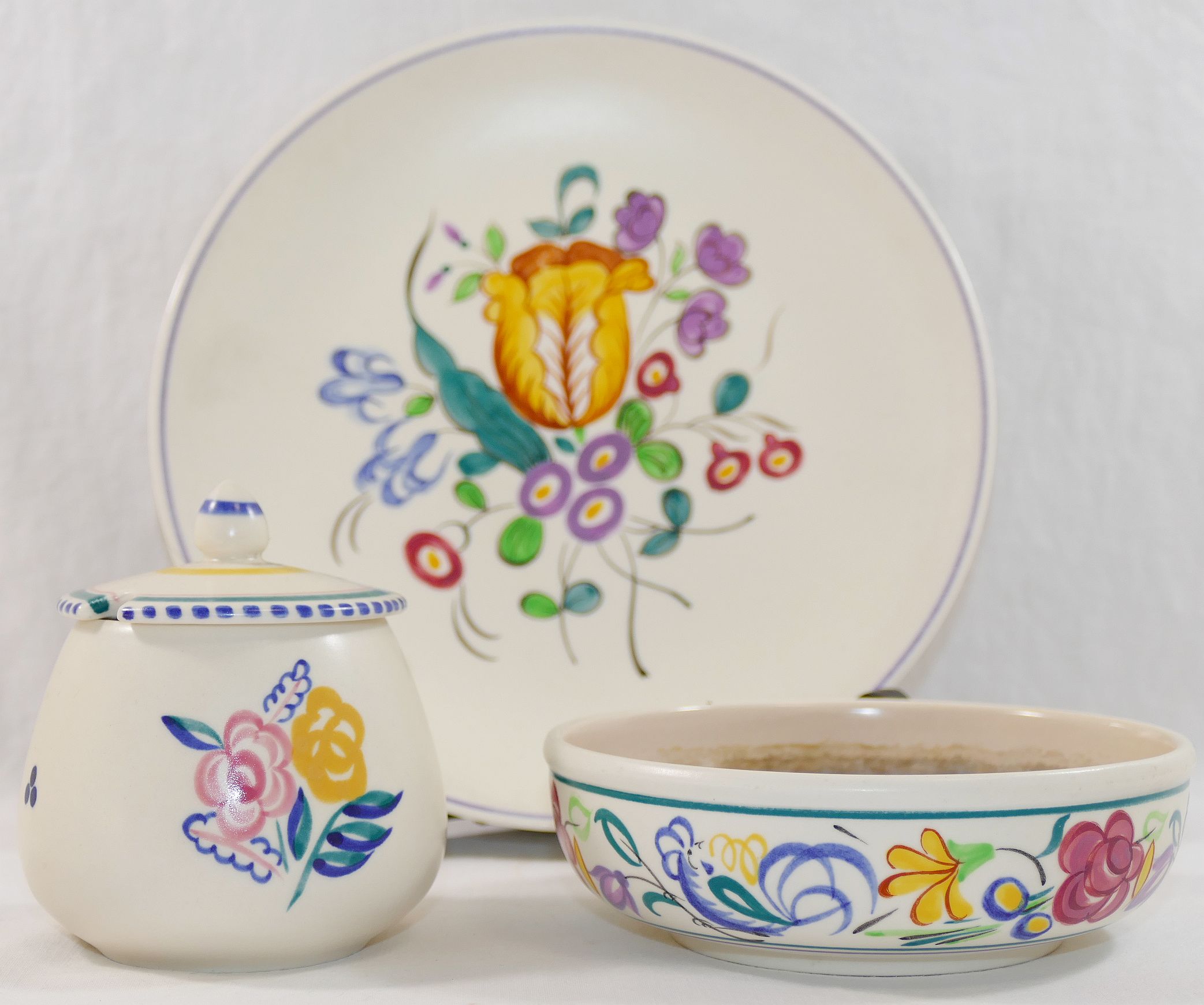 A collection of twelve items of mainly 1950's and later Poole Pottery, hand painted with flowers, - Image 4 of 5