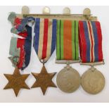 A WWII medal group comprised of the War medal, the Defence medal, the 1939-1945 Star and the