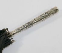 An Anglo-Indian silver handled black S Fox and Co. Paragon umbrella, the handle 15.5cm long embossed