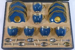 A Royal Worcester coffee service, with powered blue ground and gilt decoration, with puce marks