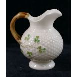 A Belleek second mark basket weave shamrock jug, 10cm high and German Belleek style semi-porcelain