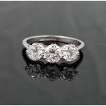 A three stone diamond ring, the round brilliant cut stones approximately 0.45ct, 0.55ct and 0.