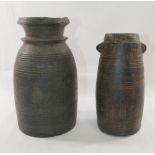 Two Nepalese turned wooden vessels, the larger 24cm high, the smaller 20.5cm highCONDITION REPORTS &