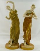 A pair of Worcester Hadley figures of classical ladies playing instruments, with printed green