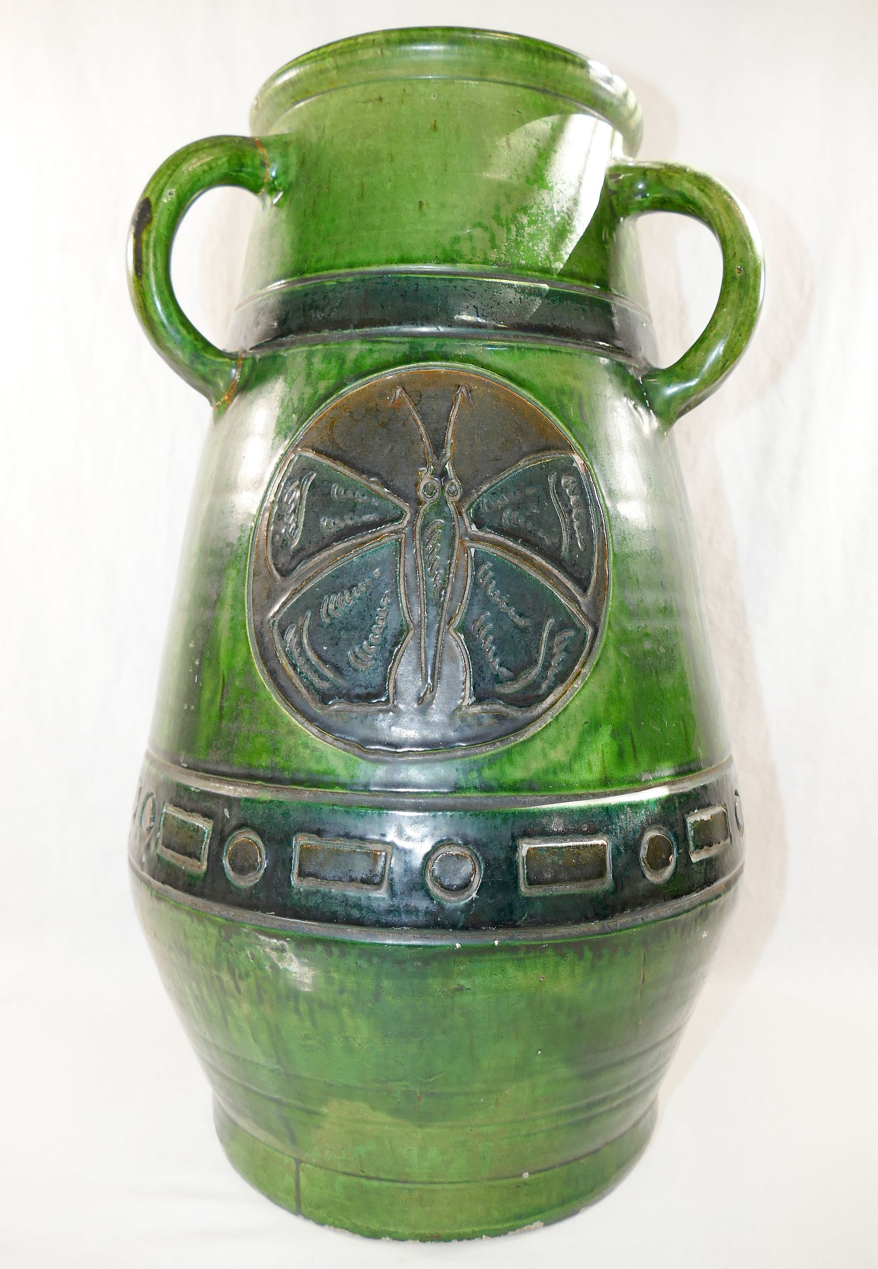 A large Studio Pottery green glazed three handled vase, decorated with incised circular panels of - Image 2 of 2