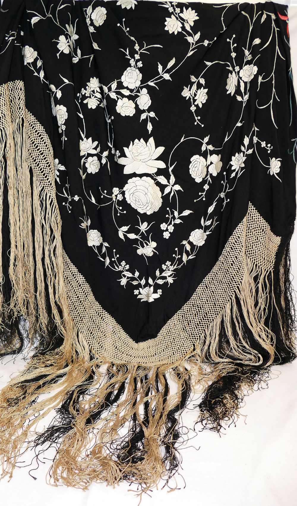 A large Chinese black embroidered shawl, decorated with polychrome flowers with cream and black - Image 2 of 4