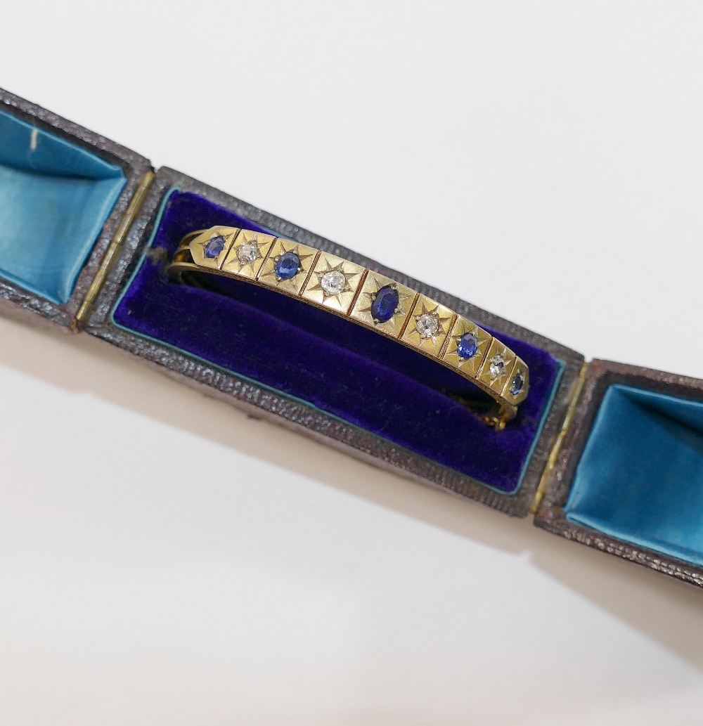A late19th/early 20th century possibly French sapphire and diamond set hinged bangle, the four old- - Image 3 of 3