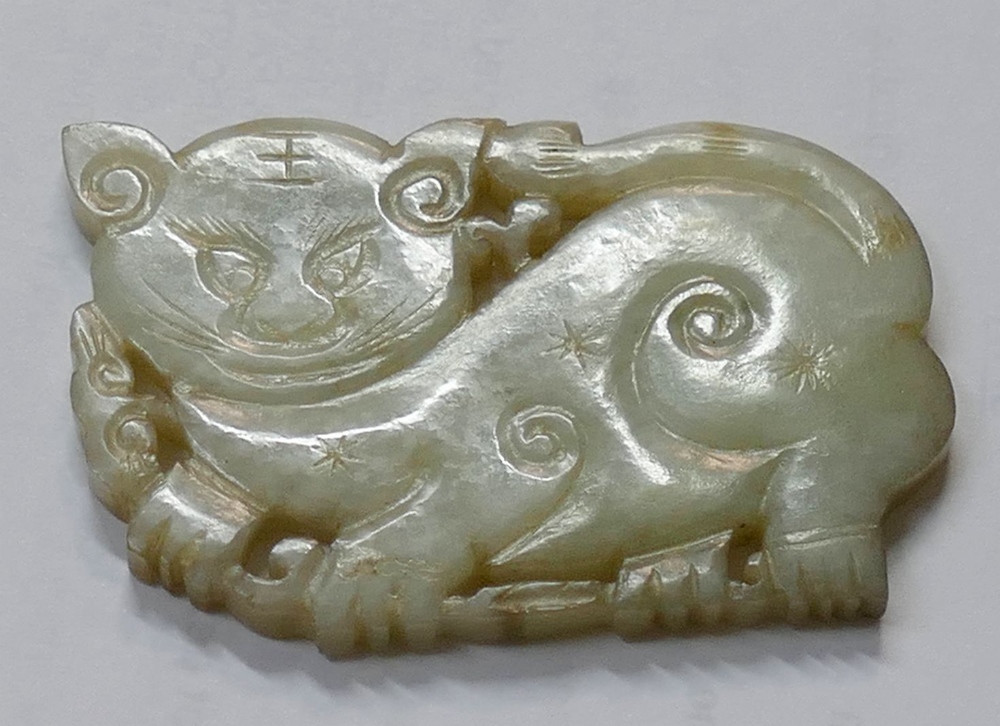 A Chinese carved stone panel in the form of a cat, 6cm long, on hardwood stand, and a pierced and - Image 3 of 5