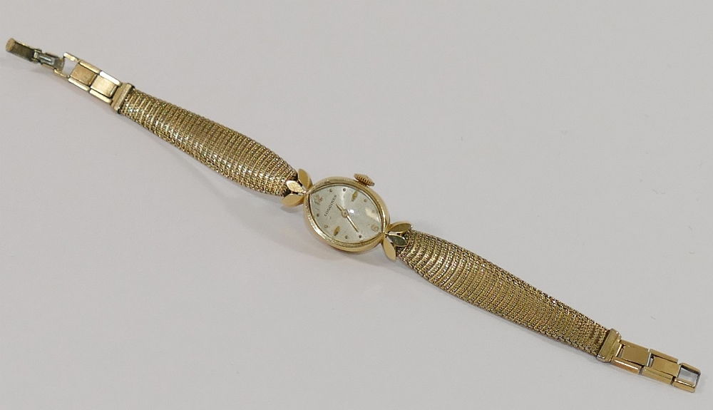 A ladies Longines ladies bracelet watch, the case stamped '14K GOLD', with gold plated