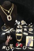 A large collection of 20th century paste set jewellery including brooches, necklaces, earrings and