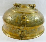 A 19th century Indian circular brass betel nut pandan box, with ornately embossed decoration and