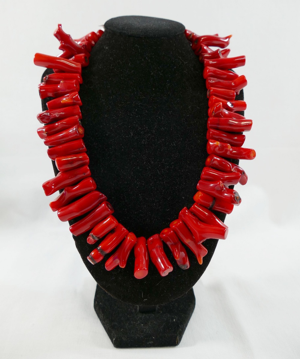 A bamboo red coral fringe necklace, 44cm long We are pleased to be offering this lot from the