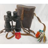 Three pairs of vintage binoculars comprised of a pair of Skybolt 10 x 50, Ross of London Steplux 7 x