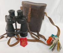 Three pairs of vintage binoculars comprised of a pair of Skybolt 10 x 50, Ross of London Steplux 7 x