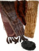 A large fur stole, another smaller fur stole, a fur collar and a fur hat (5 items)CONDITION