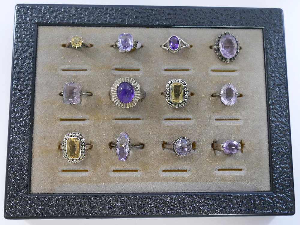 A collection of 12 amethyst and citrine set rings, including some set with marcasite, most - Image 3 of 3