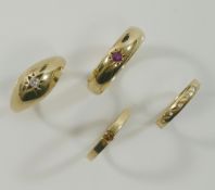 A 9 carat gold single stone diamond gypsy ring, the round brilliant cut diamond approximately 0.12