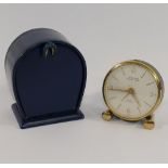 A selection of watches and travel clocks, including a 1970's gold-plated gents Timex wrist watch
