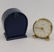 A selection of watches and travel clocks, including a 1970's gold-plated gents Timex wrist watch