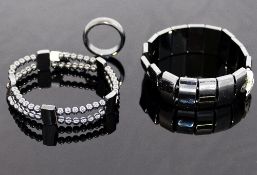 A quantity of hematite jewellery comprised of two bracelets, an individually knotted beaded