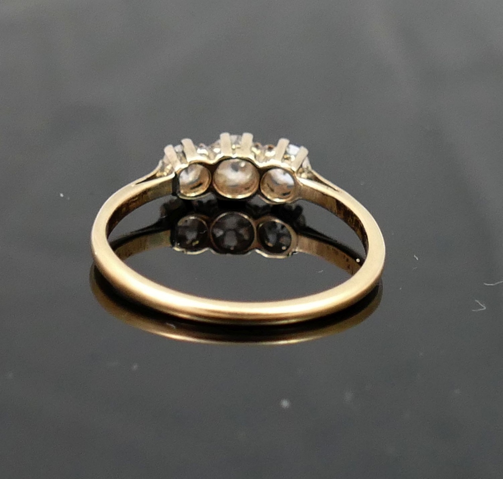 A diamond three-stone ring, the graduated old-cut stones approximately 0.15, 0.23 and 0.15 carats, - Image 4 of 4