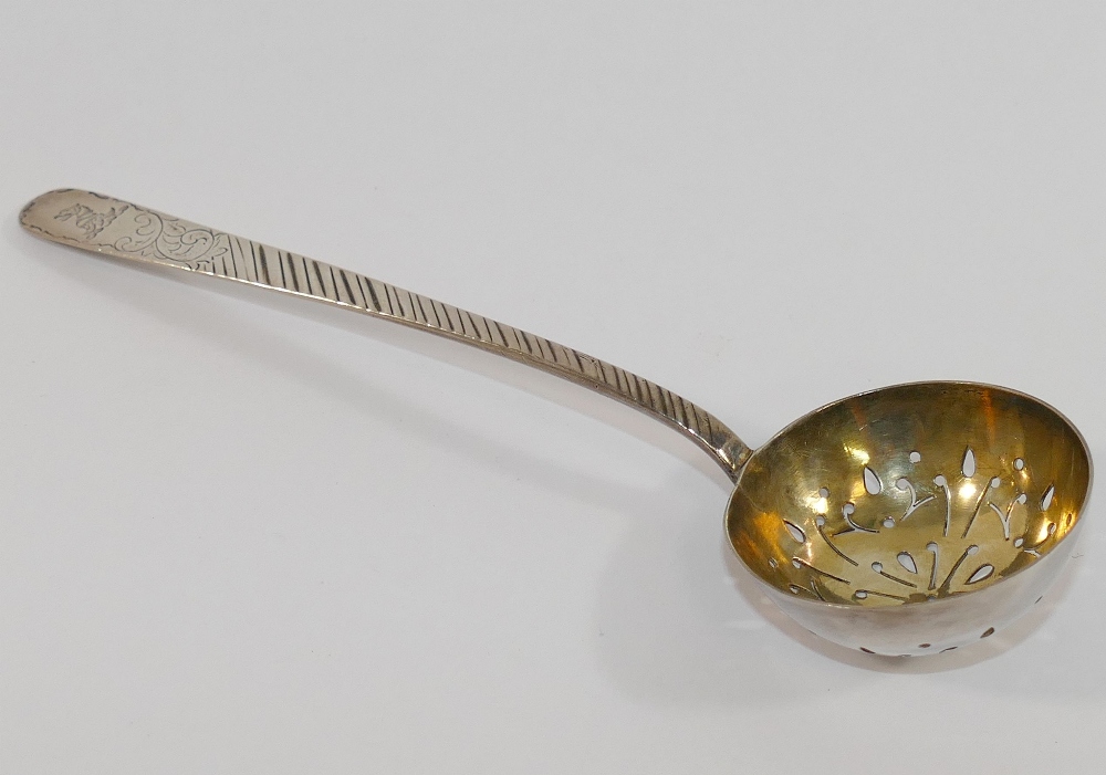 A late Victorian silver sifter spoon, with gilt bowl, London 1896, a pair of early 19th century - Image 2 of 3