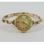 A 9 carat gold cased ladies bracelet watch, with expanding strap marked '9CT', 18.5g gross,