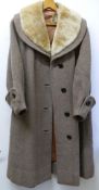 A ladies Harella heavy winter coat with faux faux collar and an Escott grey winter coat (2 items)