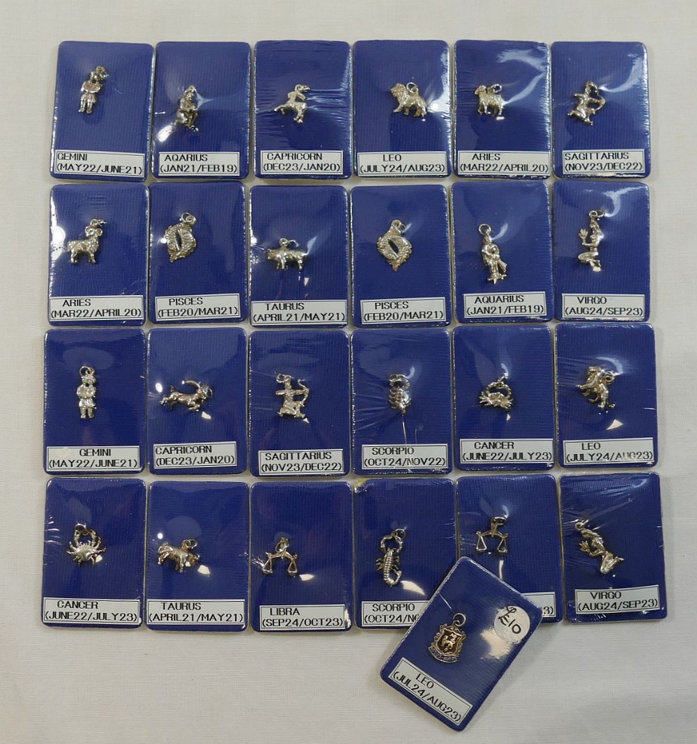 25 signs of the zodiac pendants stamped '925' and 'silver' We are pleased to be offering this lot