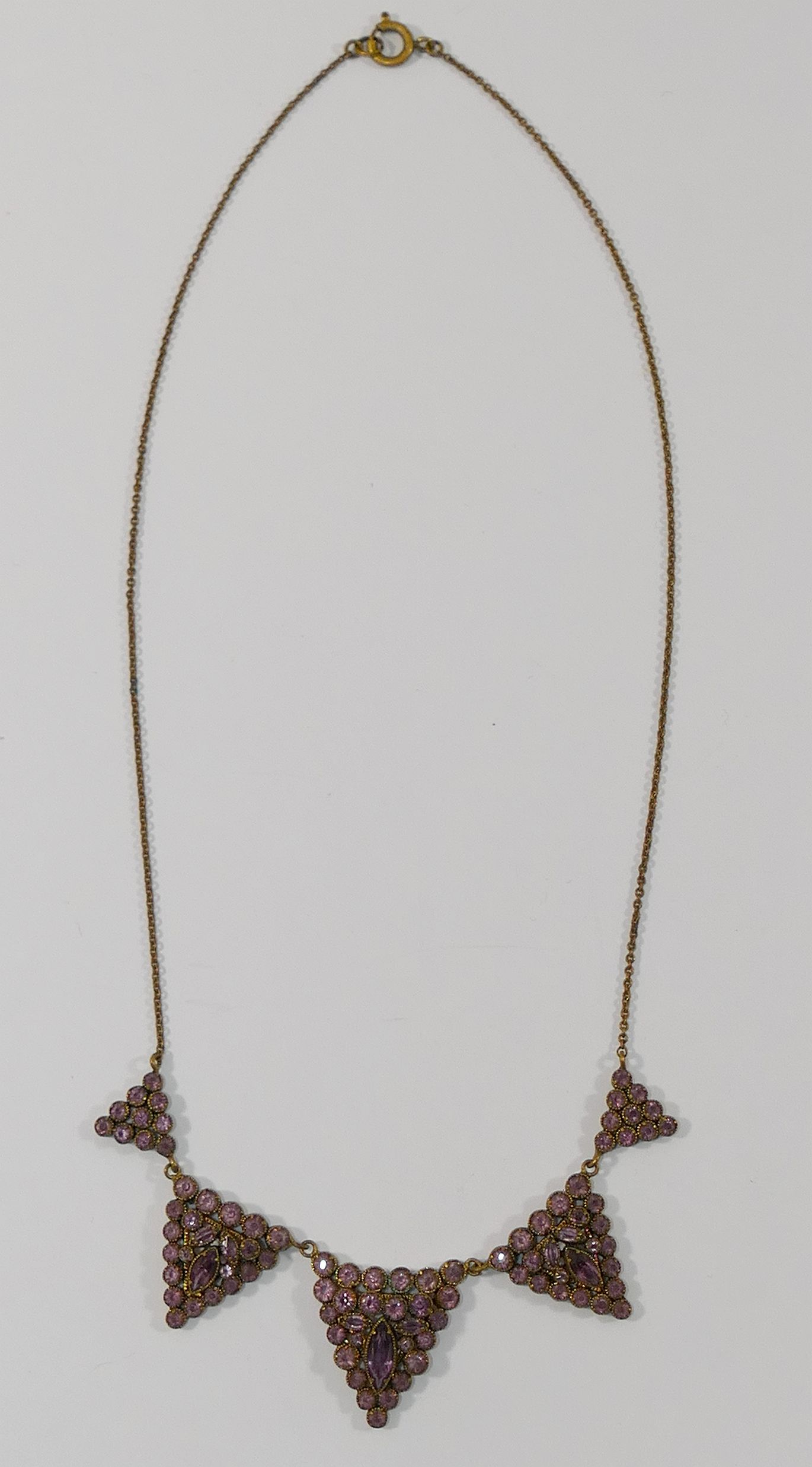 Five early 20th century and later paste set necklaces, including  a gold plated example set with - Image 6 of 7