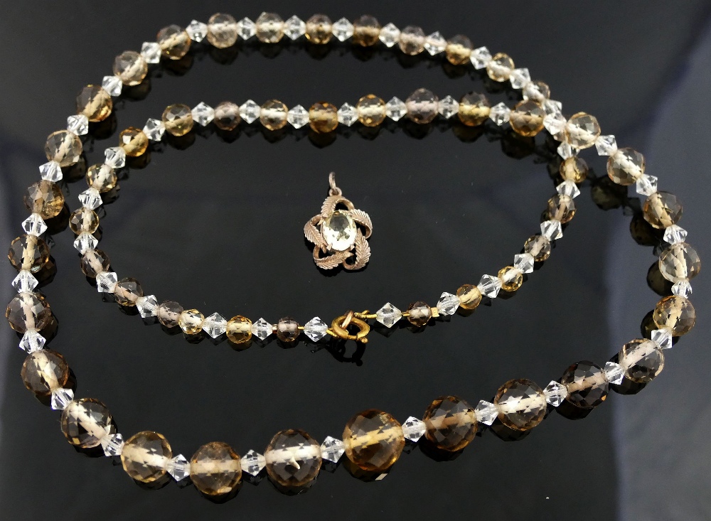 A selection of rock crystal and smokey quartz jewellery comprised of a 'Miracle' silver rock crystal - Image 2 of 6