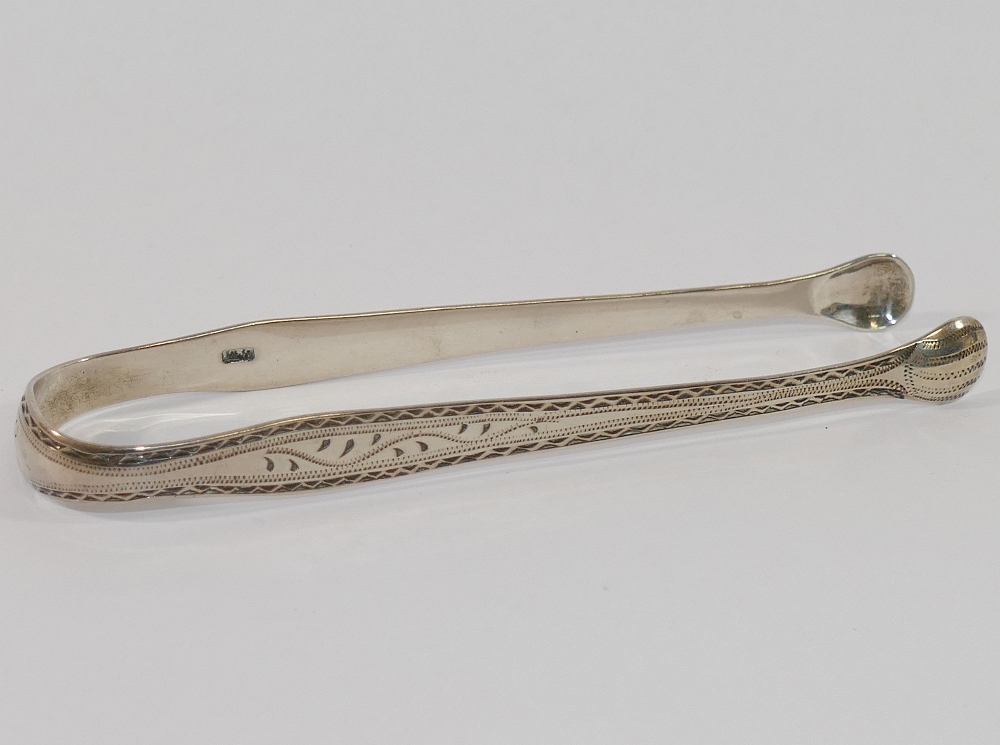 A late Victorian silver sifter spoon, with gilt bowl, London 1896, a pair of early 19th century