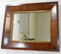 A 19th century rosewood framed rectangular wall mirror with gilt slip, glass 36cm x 26.5cm, frame