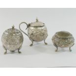 This lot has been withdrawn - A pair of Indian silver egg-shaped pepperettes/pounce pot, another