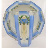 An Art Nouveau wash jug and bowl, with floral transfer printed decoration and panelled sides, the