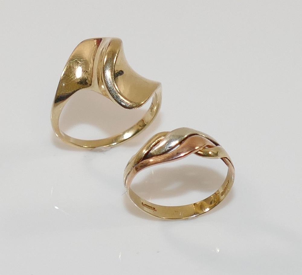 Two 9 carat gold rings comprised of a tri-colour ring, finger size L, and an abstract ring, finger