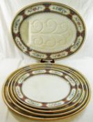 A large quantity of Minton 'Chinese Key' dinnerware comprised of two large oval serving plates, 55cm