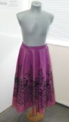 A Sportaville vintage purple satin skirt with black flocked design, a full length silk dress the