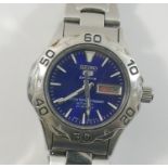 A ladies Seiko 5 Sports 4207-00A0 Automatic 100m wrist watch, the blue dial with baton numerals