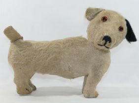 An early 20th century mohair short legged terrier type dog, the turning head with amber glass eyes