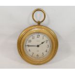 A gilt metal cased circular Jaeger wall clock in the form of a pocket watch, with battery powered