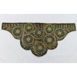 A beetle wing and gilt thread embroidered black velvet shaped panel, 52cm x 24cm CONDITION REPORTS &