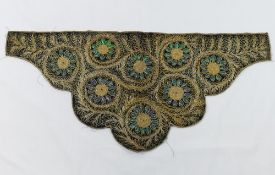 A beetle wing and gilt thread embroidered black velvet shaped panel, 52cm x 24cm CONDITION REPORTS &