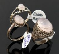 A quantity of rose quartz jewellery, comprised of three rings, a brooch, two pendants, two pairs