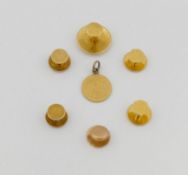 A collection of dress studs, buttons, cuff links and other items, including three 18 carat gold